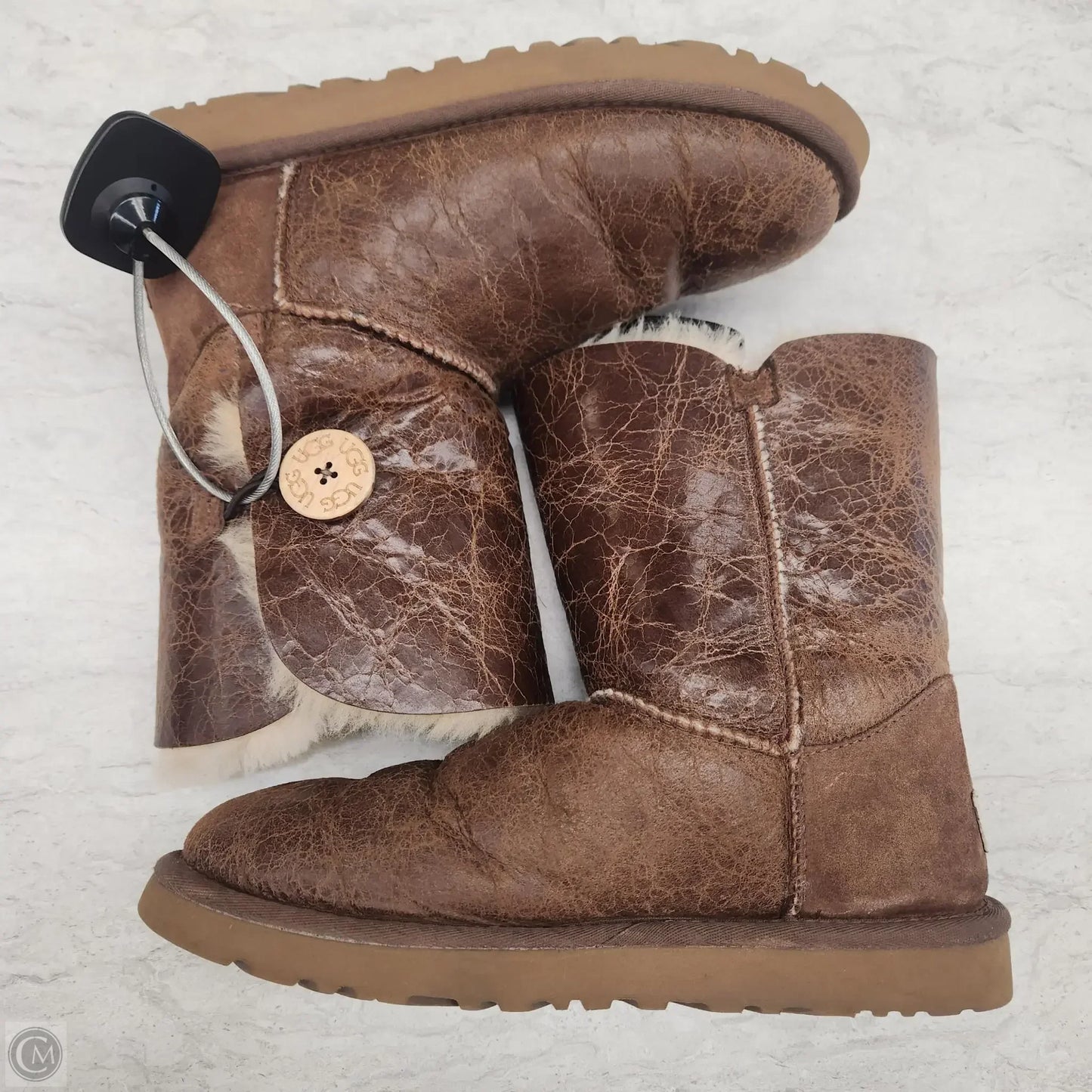 Boots Designer By Ugg In Brown, Size: 7