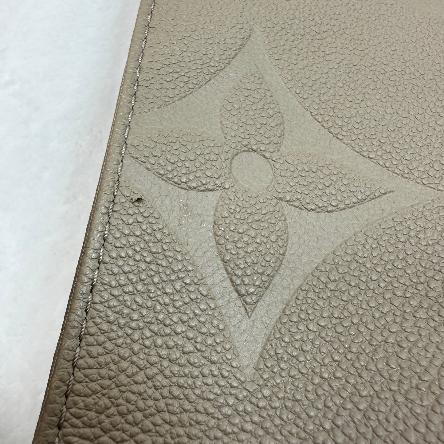 OnTheGo MM tote bag Tourterelle (turtledove) beige Monogram Empreinte leather Handbag Luxury Designer By Louis Vuitton, Size: Medium