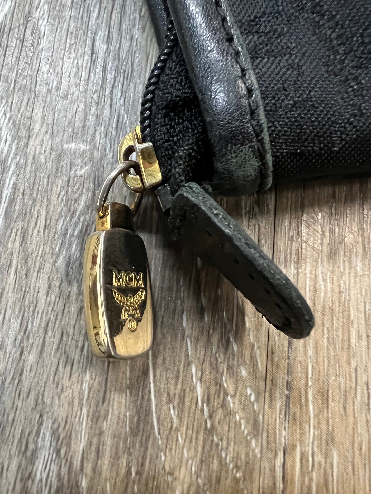 Clutch Luxury Designer By Mcm, Size: Medium