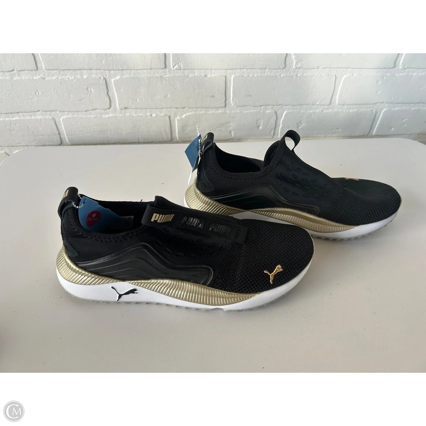 Shoes Sneakers By Puma In Black & Gold, Size: 8