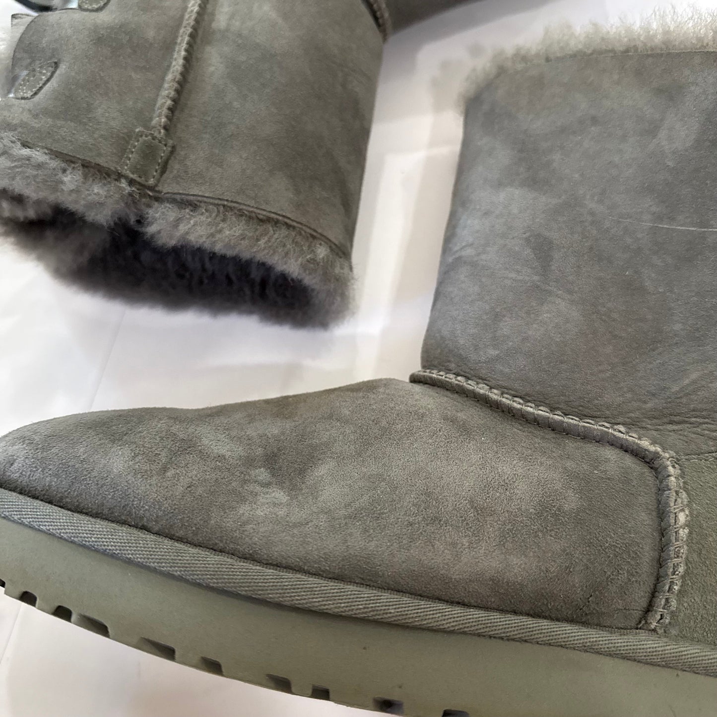 Boots Designer By Ugg In Grey, Size: 9