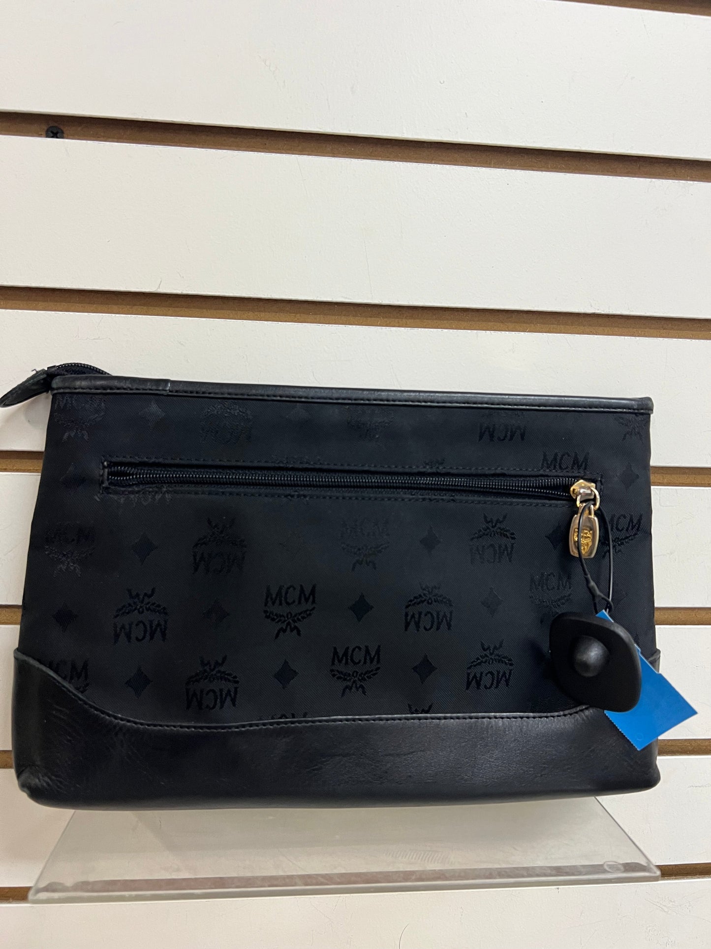 Clutch Luxury Designer By Mcm, Size: Medium
