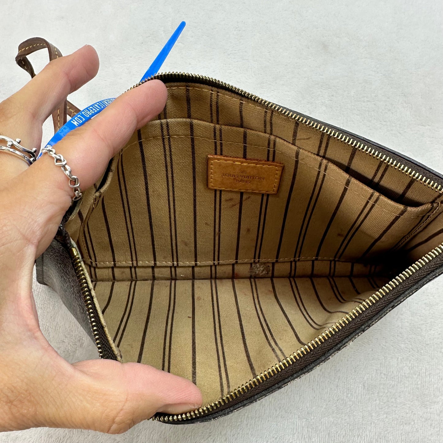 Wristlet Luxury Designer By Louis Vuitton, Size: Medium
