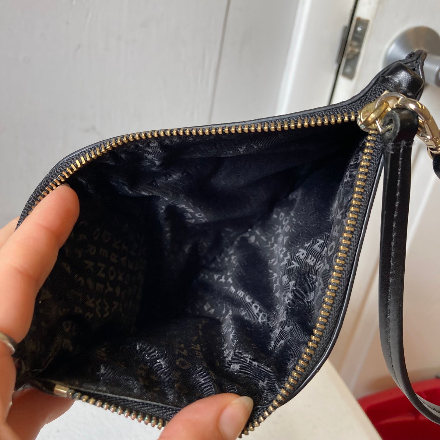 Wristlet Designer By Kate Spade In Black, Size:Medium