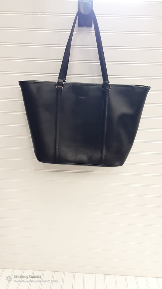 Isabelle Hartmann wearing black Hermes Kelly bag, black vintage